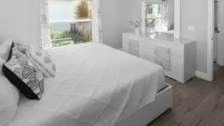 The third bedroom seen from a different angle - flooded with light and modern