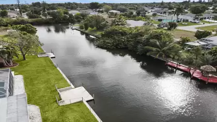 Freshwater canal surrounded by greenery creates a calm setting for relaxing moments by the water