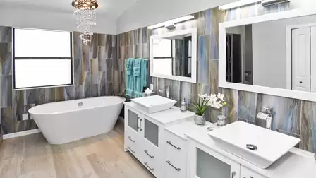 Super modern master bathroom with double sinks and freestanding bathtub