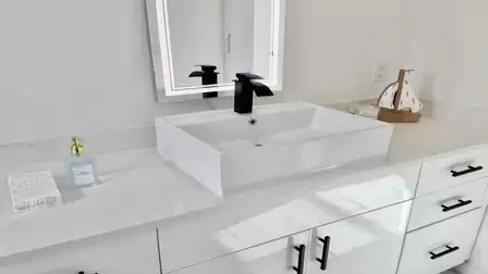 Modern vessel sink with a stylish faucet, illuminated mirror, and elegant bathroom furnishings.