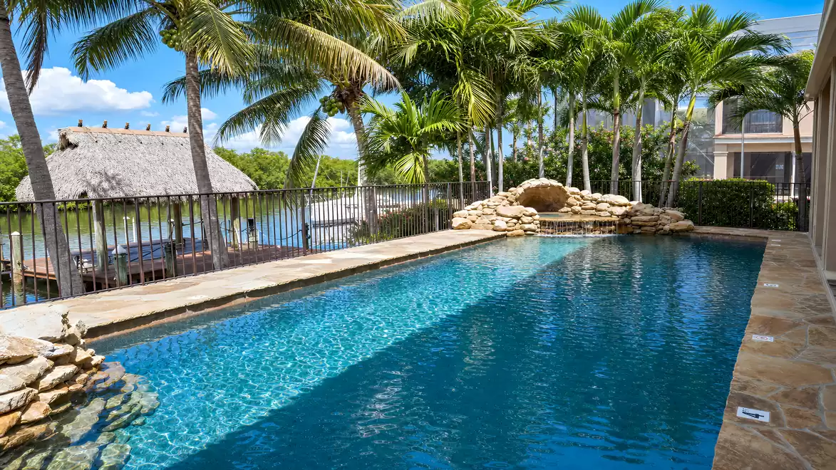 The pool is surrounded by picturesque rock elements
