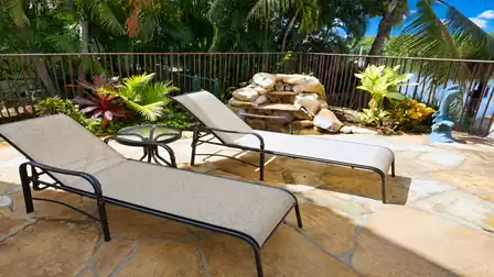 The pool area faces west and includes a sundeck