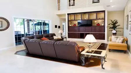 The comfortable leather couch is ready for movie night