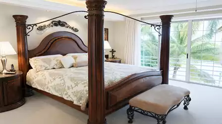 The master bedroom features a King size bed
