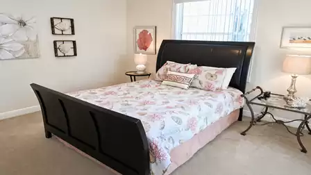 The second bedroom is equipped with a Queen size bed