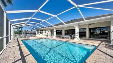 The pool area includes the covered lanai and a sundeck