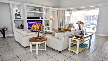 The inviting living room is held in neutral colors