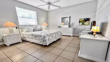 The comfortable second bedroom includes a King size bed