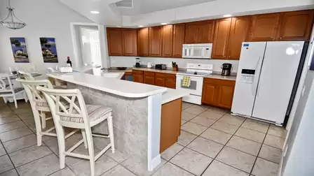 Naturally, the kitchen is fully equipped