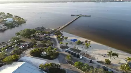 View over the beach and the pier to the river
