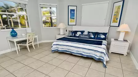 The third bedroom features a King size bed and impresses with its color accents