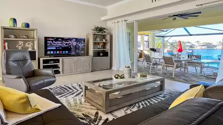 A large-screen TV is also a must in the living room