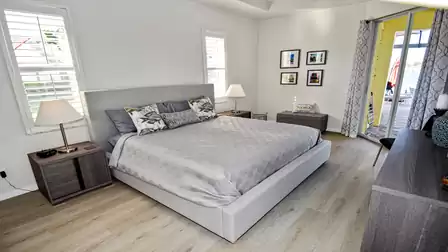 The master bedroom offers ultra modern design and a King size bed
