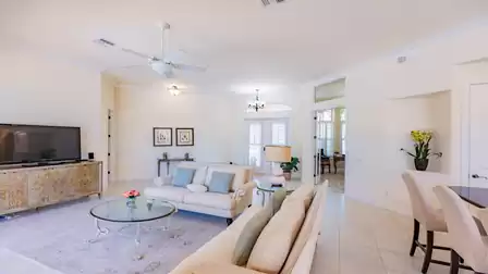 The elegant living room is held in soft beige