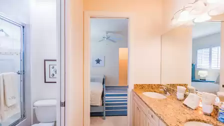 The second bath features a double sink