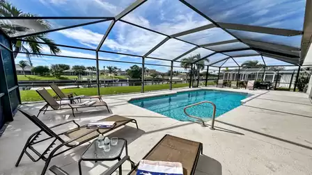 Terrace in southern exposure with pool and cozy sun lounger