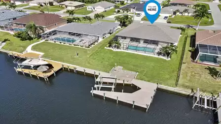 Boat dock and lift on the canal. Rent a boat and explore the Cape Coral area