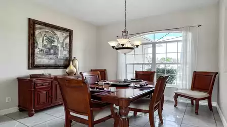 Formal dining area with big window