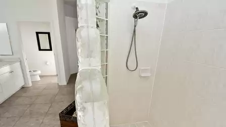 Large walk-in shower and separate toilet