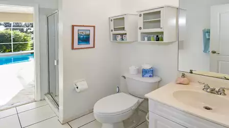 Bathroom with shower and access to the pool