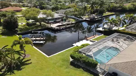 View over the pool area to the surroundings from a height of 196 feet