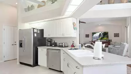 From the kitchen you have a view into the living room or onto the beautiful terrace