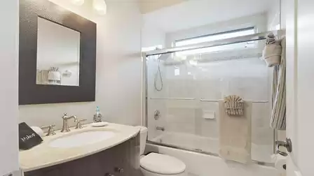 The 2nd bathroom with a bathtub/shower