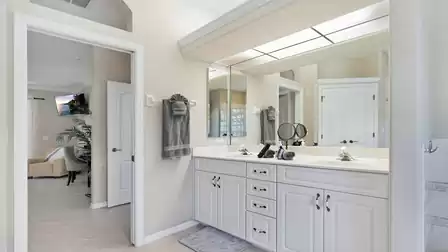 The master bath includes a tub, a glass block walk-in shower ...