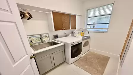 Utility room with washer and dryer