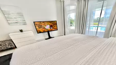 You can also watch TV from your bed here
