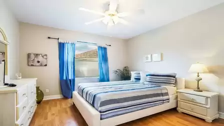 The second bedroom features a Queen size bed