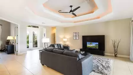 The living room offers modern yet comfortable furnishings