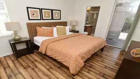 Guest bedroom with oversized double bed and access to the terrace