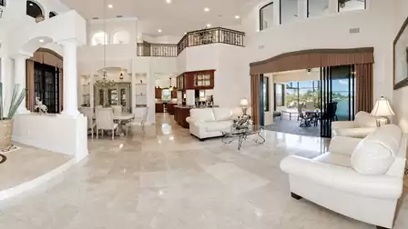this classy picture perfect living space with views of the pool area will take your breathe away