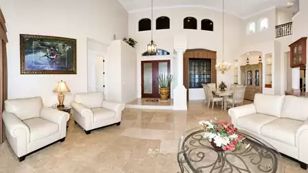 marble floors will lead you into the formal dining area 