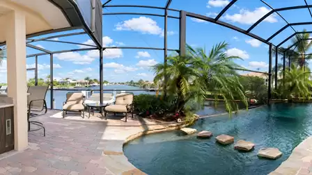 this lanai is large and has an exquisite decor a outdoor kitchen area for barbecues