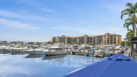 Have something to eat or drink while enjoying the view over the marina