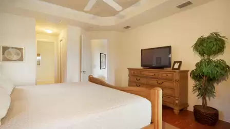 Style elements like the tray ceiling add to the room’s atmosphere