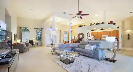 A large leather sectional sets a distinct accent in the living room