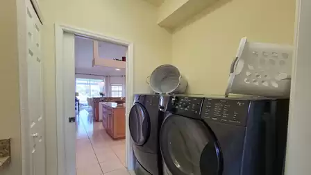 Laundry room with washing machine and dryer