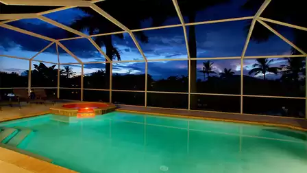 The lighting makes the entire pool area inviting at night