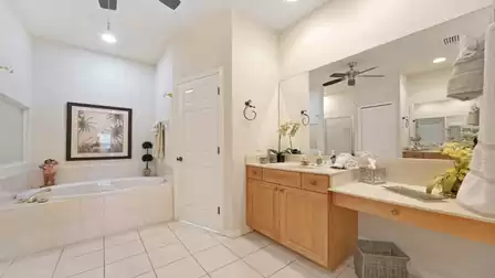 The master bath offers both tub and walk-in shower