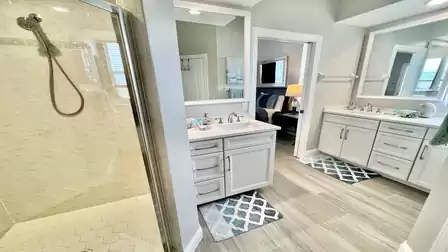 The master bath features a shower and two sinks