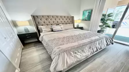The second bedroom is equipped with a King size bed