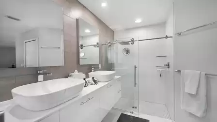 The master bath offers a shower and double sinks