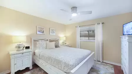 Tasteful furnishings make the third bedroom just as attractive as the others