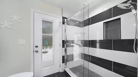 Bathroom with shower and WC in black