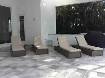 Several lounge chairs are waiting for the next vacationers