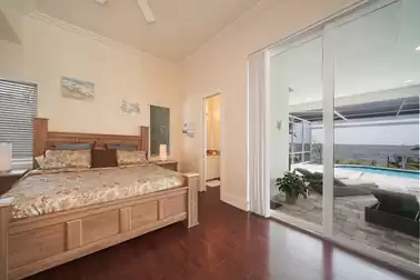 A King size bed can be found in this bedroom