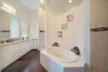 Bathroom #6 includes both tub and shower